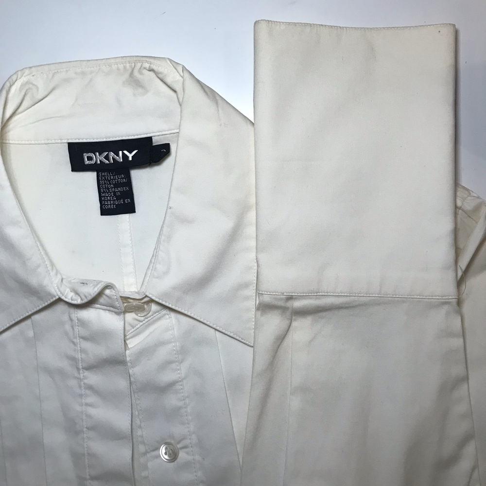 DKNY button down white shirt. Gently worn